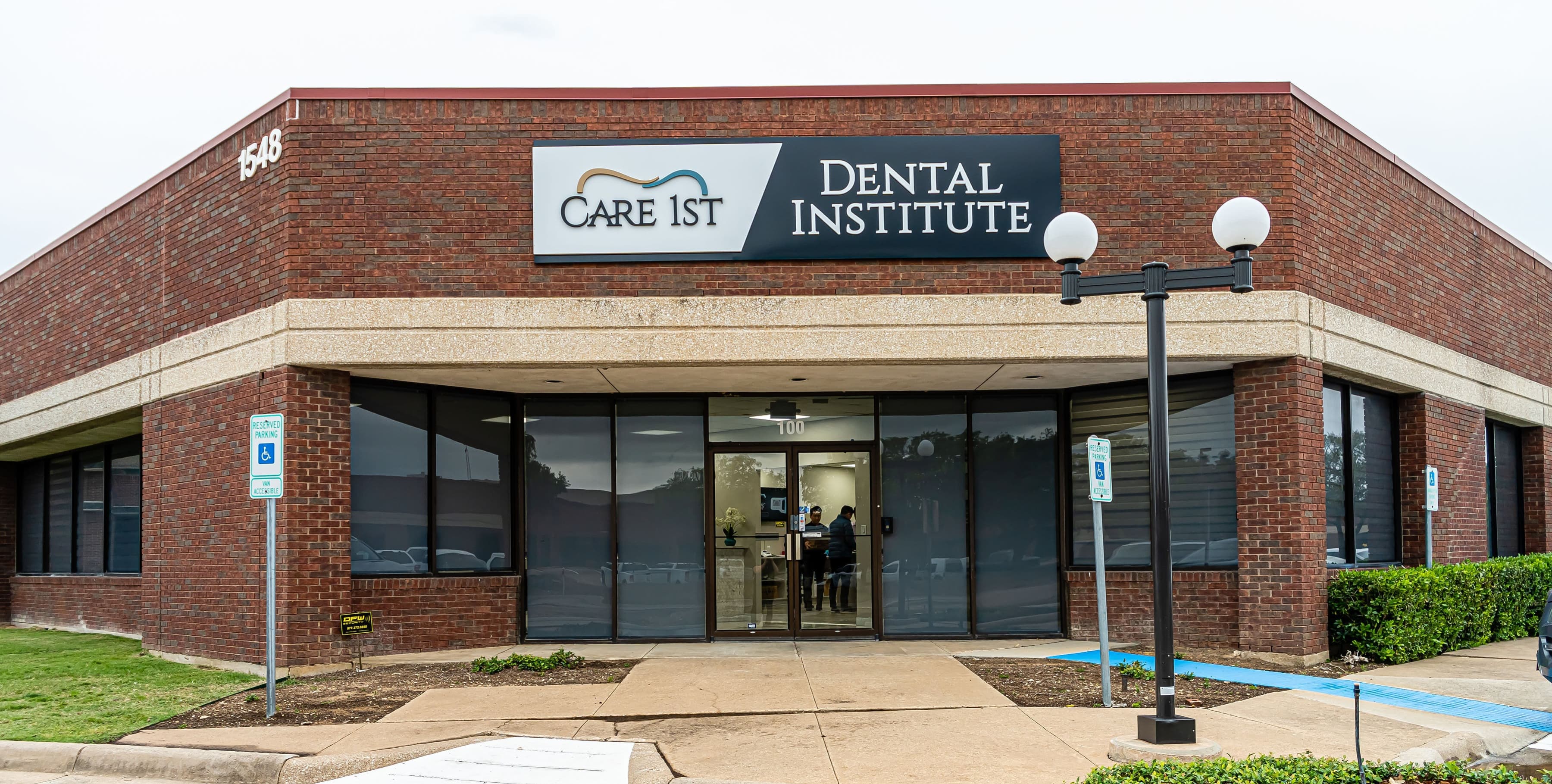 Care1st Dental Institute building entrance with institute signage at 1548 Valwood Parkway